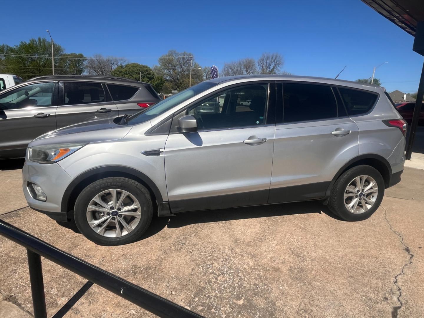 2017 SILVER FORD ESCAPE SE SE 4WD (1FMCU9GD4HU) with an 1.5L L4 DOHC 16V engine, 6A transmission, located at 8101 E. Skelly Dr., Tulsa, OK, 74129, (918) 592-3593, 36.121891, -95.888802 - Photo#1